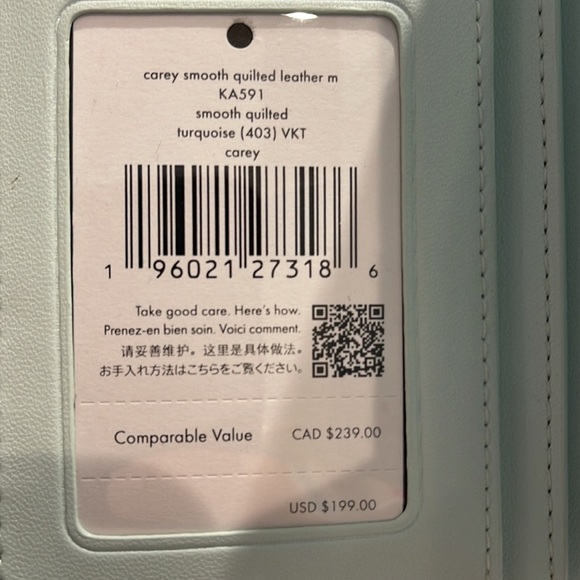 Kate Spade Carey Medium Compartment Bifold Wallet
COLOR: Turquoise - Picture 4 of 16